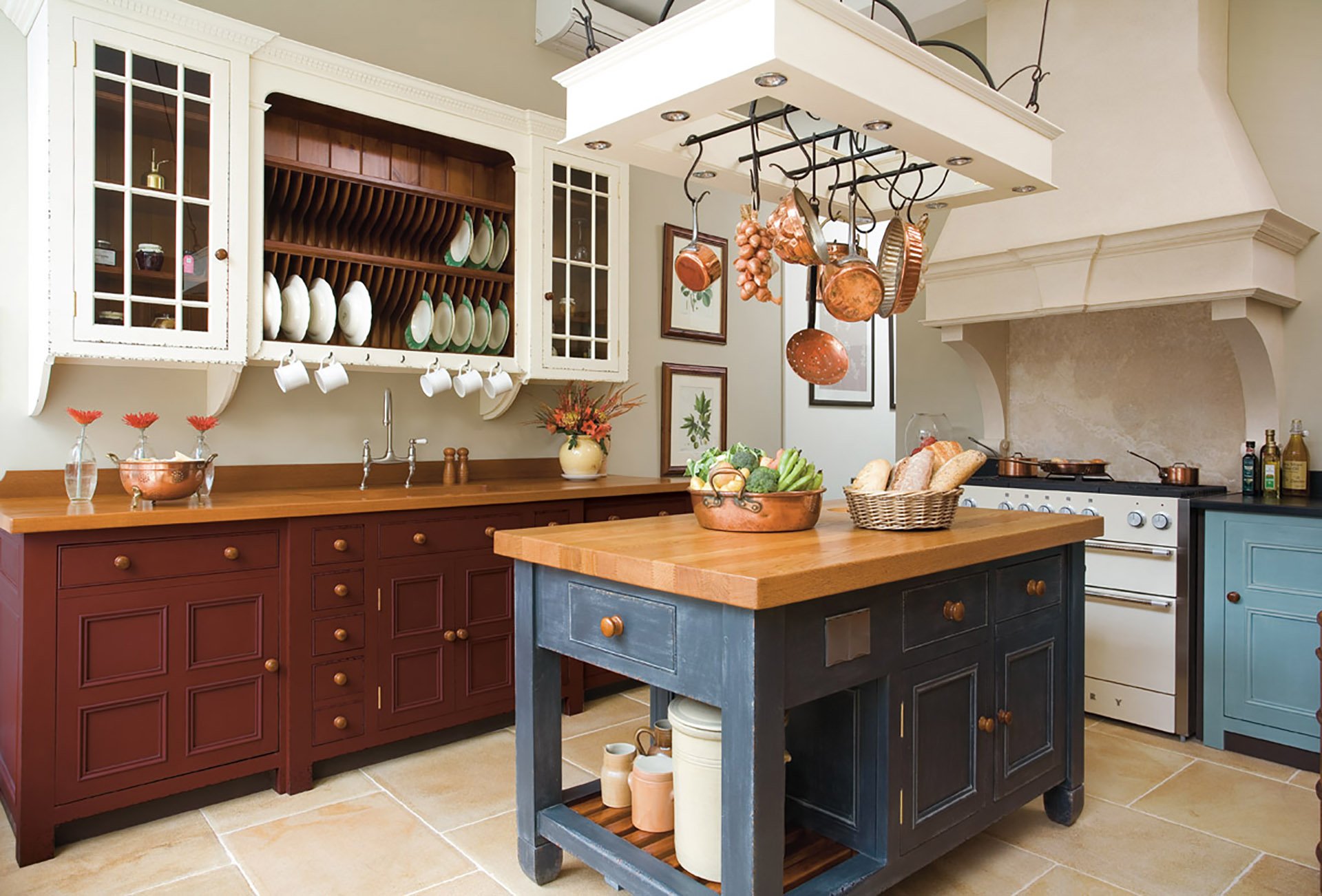 A kitchen with table in the middle of a room